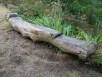 Banc sculpté dans un tronc d'arbre